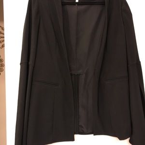BCBG generation black blazer , bell sleeves with a slit